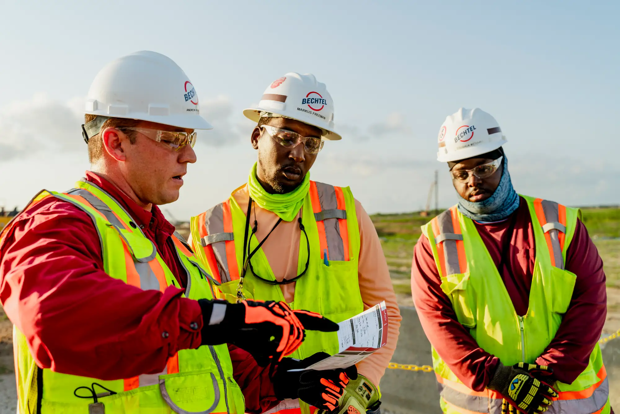 Team leader reviews Focus 4 Safety card with craft professionals